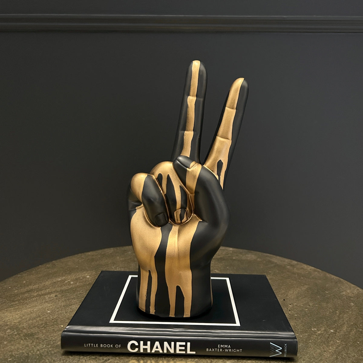 Black and gold peace sign hand ornament